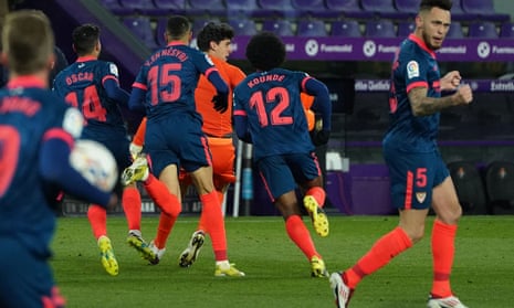 The Sevilla goalkeeper Yassine Bono (centre) is pursued by teammates after scoring a stoppage-time equaliser against Valldolid.