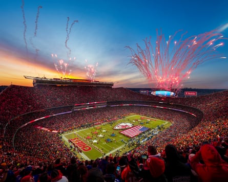 A wide shot of fireworks exploding during a Kansas City Chiefs NFL game.
