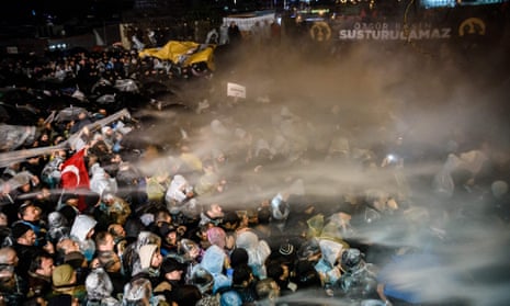 Turkish anti-riot police launch water cannon and teargas to disperse supporters of the Zaman newspaper in Istanbul.