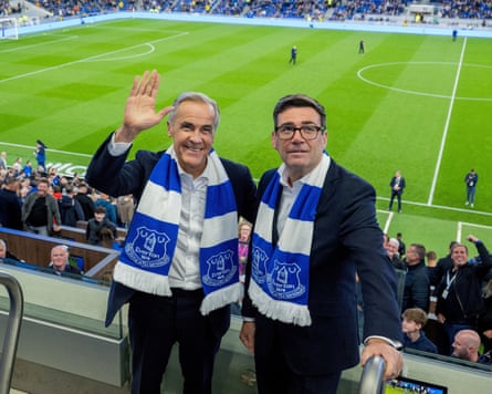 Mark Carney and Andy Burnham at Hill Dickinson Stadium.