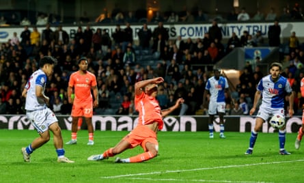 Blackburn Rovers’ Ryoya Morishita scores the opening goal despite the attentions of Coventry City’s Bobby Thomas.