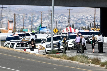 police cars surround a vehicle