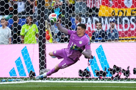 Paraguay goalkeeper Orlando Gill saves a penalty from Germany’s Kai Havertz in the shoot-out.