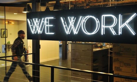 A man enters WeWork’s co-working space in Washington, US.