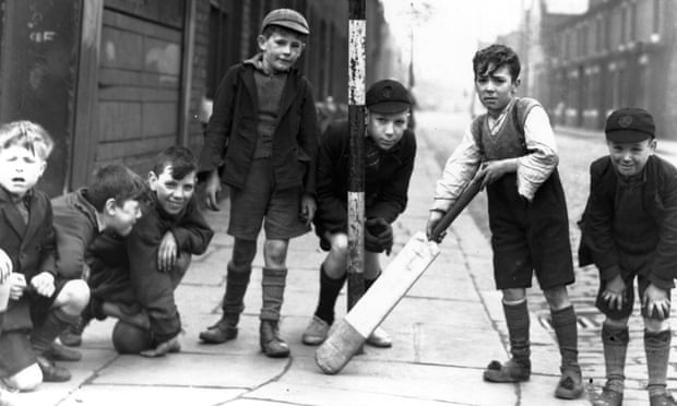 Children play cricket in Salford in the first ‘play street’.