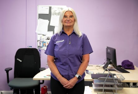 A blond woman wearing a purple shirt branded ‘Back on the Map’