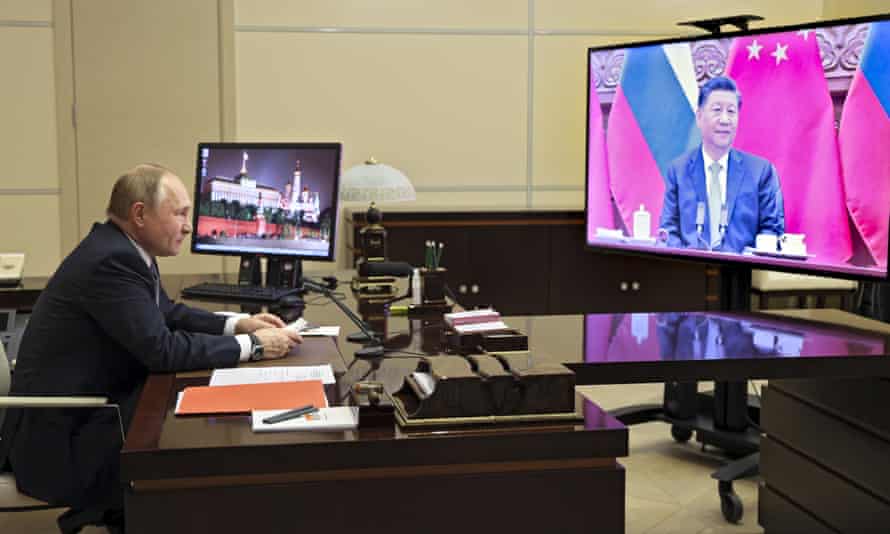 Vladimir Putin en una videoconferencia con Xi Jinping en diciembre