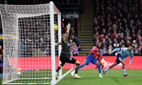 Crystal Palace's Michael Olise scores their first goal.