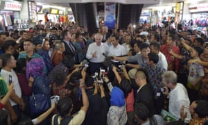Malcolm Turnbull with the Indonesian President Joko Widodo at the Tanah Abang retail market in Jakarta. ‘Been for a bit of shopping?’ he asked our reporter.