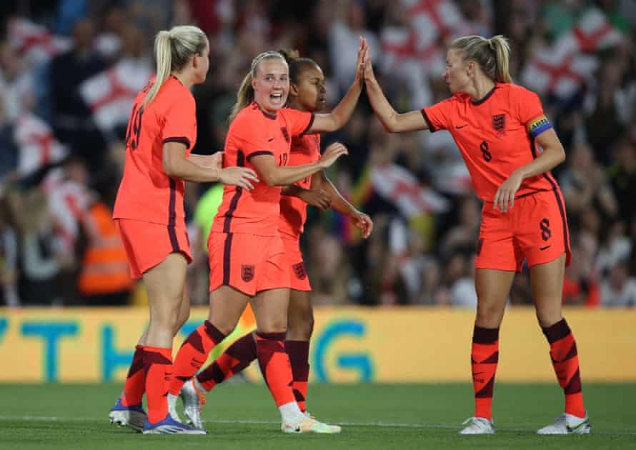 England's Beth Mead (second from left) celebrates scoring their fifth goal with team mates.