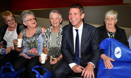 NSW Premier Mike Baird meets with attendees at a NSW Seniors Week Premier’s Gala Concert, in Sydney, Tuesday, March 17, 2015. Mr Baird has pledged to commit $2 million to help the state’s 1.3 million seniors card holders leverage better deals with the private sector. (AAP Image/Dan Himbrechts) NO ARCHIVING