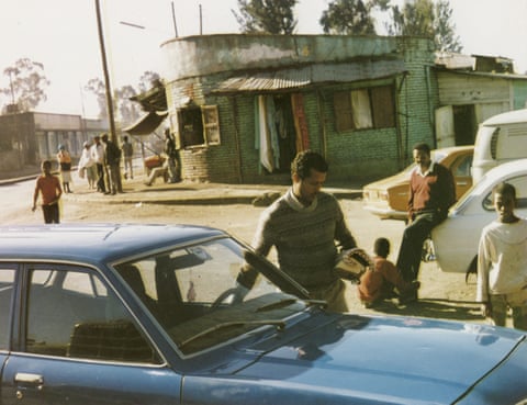 Terefe arriving at the garage he worked at in Sengatera with his Mazda 818