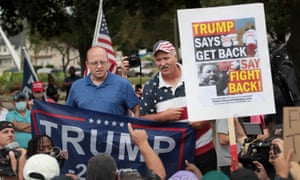 Trump supporters and protesters gather near the Kenosha county court while Donald Trump visits the city on 1 September.
