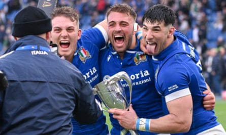 Italian players celebrate with their trophy in Rome