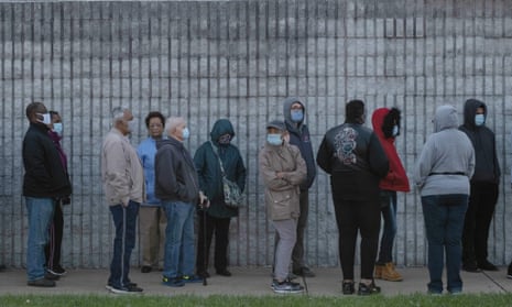 US-VOTE-OHIO<br>Residents of Lucas County, Ohio wait in line to cast their vote during early voting in the US state of Ohio on October 6,2020 in Toledo, Ohio. (Photo by SETH HERALD / AFP) (Photo by SETH HERALD/AFP via Getty Images)
