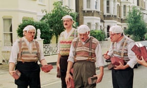 From left, Terry Jones, John Cleese, Michael Palin, Terry Gilliam and Eddie Izzard dressed as Gumbies in 1999.