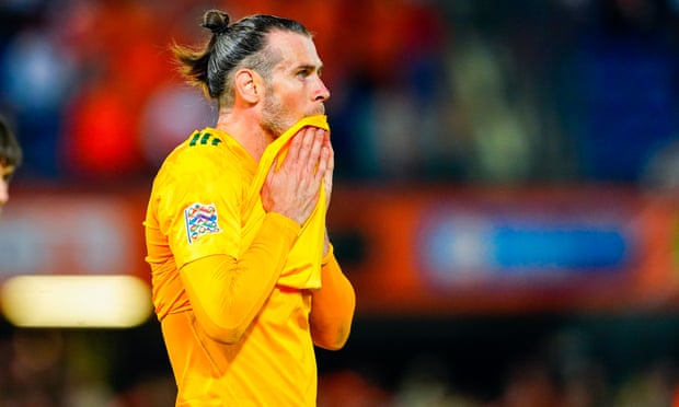 Gareth Bale looks dejected after Wales slip to defeat against the Netherlands, despite his late penalty.