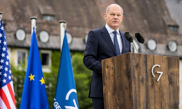 The German chancellor, Olaf Scholz, who is chairing the G7 this year, speaks to the media on the last day of the summit at Schloss Elmau, Germany