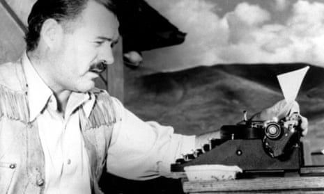 Ernest Hemingway at his typewriter as he works on For Whom the Bell Tolls at Sun Valley lodge, Idaho, in 1939. 