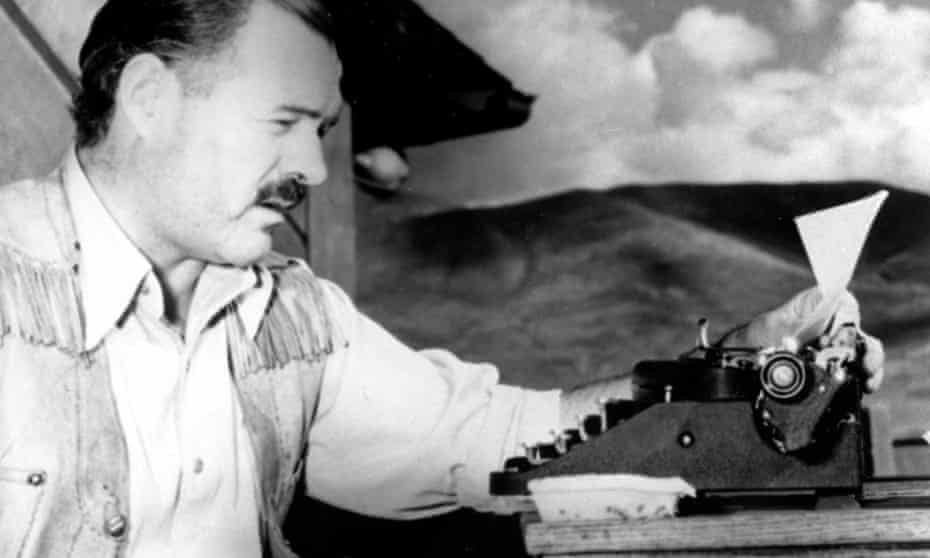 Ernest Hemingway at his typewriter as he works on For Whom the Bell Tolls at Sun Valley lodge, Idaho, in 1939. 