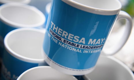 Branded mugs, bearing the name of Britain’s Prime Minister, and Leader of the Conservative party, Theresa May are pictured on the COnservative party’s election “battle” bus in Wolverhampton, central England, on May 30, 2017, as campaigning continues in the build up to the general election on June 8. / AFP PHOTO / POOL / Leon NealLEON NEAL/AFP/Getty Images