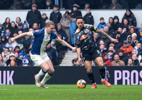Birmingham’s Christoph Klarer (left) keeps a close eye on Noah Okafor