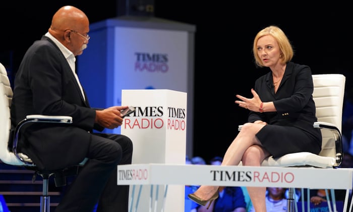 Times Radio presenter John Pienaar speaks to Liz Truss during the hustings event at the NEC on Tuesday evening.