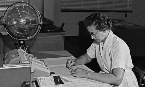 Katherine Johnson with an adding machine and a ‘celestial training device’ at her desk at Nasa’s Langley research centre in 1962