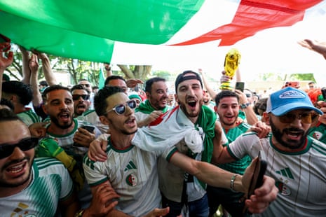 Algerian fans gather near the National WWI Museum and Memorial ahead of the Group J match between Argentina and Algeria in Kansas City, Missouri