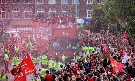 Liverpool Fc team on victory bus with fans
