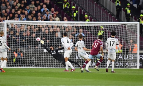 West Ham United's Lucas Paqueta scores the opening goal against Liverpool.