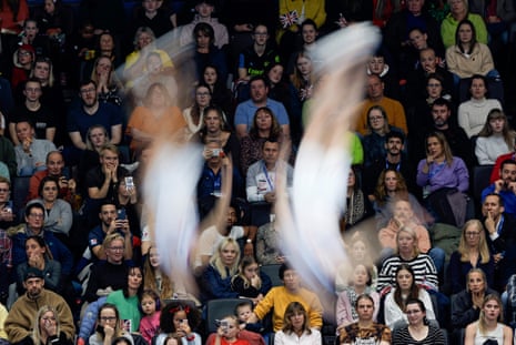 The crowd watch the French pair of Pierre Gouzou and Morgan Demiro-o-Domiro in the men’s synchronised trampoline final