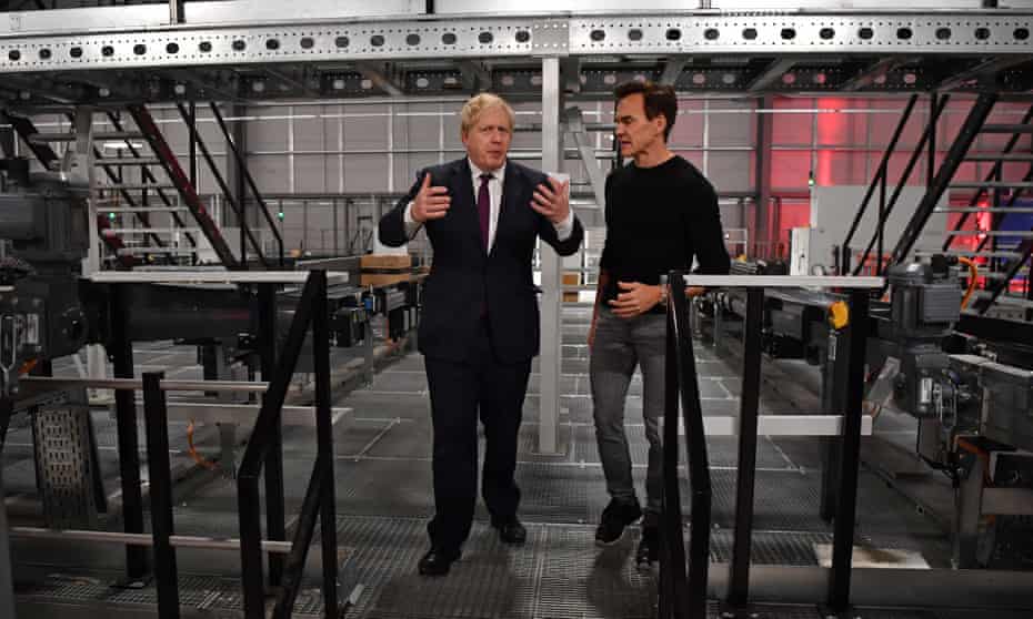 The Hut group’s founder, Matthew Moulding, shows Boris Johnson around during a visit to Warrington during the 2019 general election campaign. 