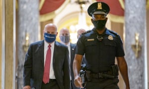 Louis DeJoy, left, on Capitol Hill in Washington DC, on 5 August.