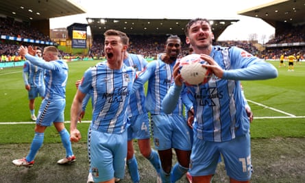 Coventry’s Haji Wright celebrates with teammates after scoring his team’s third goal against Wolves