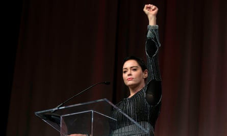 US actress Rose McGowan raises her fist during the Women’s Convention in Detroit, Michigan.
