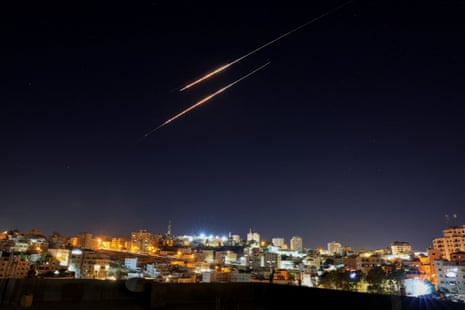 Missiles launched from Iran towards Israel are seen from Hebron, in the Israeli-occupied West Bank.