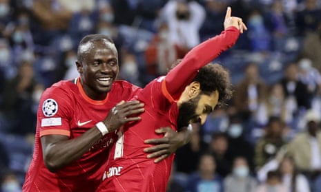 Liverpool's Mohamed Salah celebrates with Sadio Mane (left) after opening the scoring.