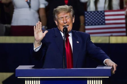 Donald Trump speaking into a microphone at a lectern