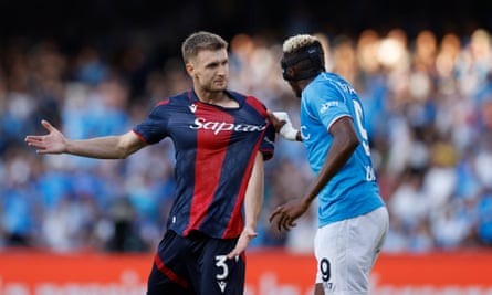 Stefan Posch tussles with Victor Osimhen during Bologna’s 2-0 win at Napoli.