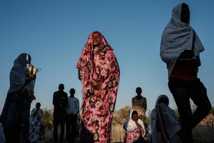 An Ethiopian refugee from the Tigray conflict attends mass at a refugee camp in eastern Sudan.