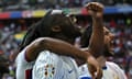 Randal Kolo Muani (centre) celebrates after his shot was deflected into the net by Jan Vertonghen to give France victory over Belgium