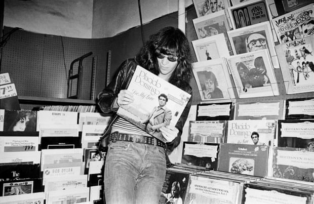 Joey Ramone goes record shopping at Free Being Records in New York.