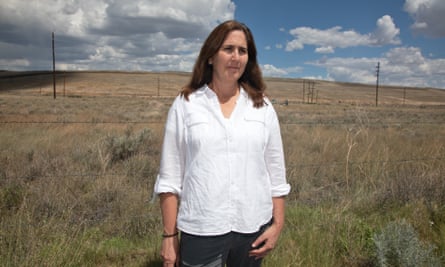 Allyson Siwik, executive director of the Gila Resources Information Project, next to Chino mine’s tailing pond.