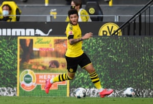 Borrussia Dortmund’s Jadon Sancho surges forward.