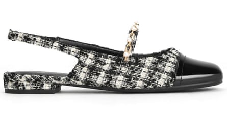 A black, white and grey tweed slingback flat shoe with a patent black toe