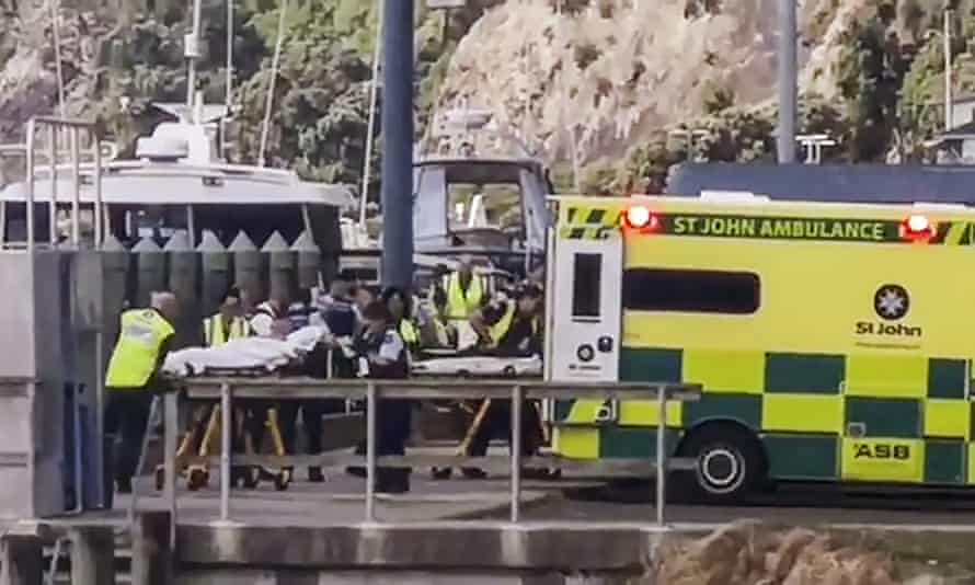 People injured in the White Island volcanic eruption are ferried into waiting ambulances in Whakatane