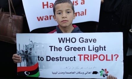 A protester demands an end to Haftar’s offensive against Tripoli, 12 April.