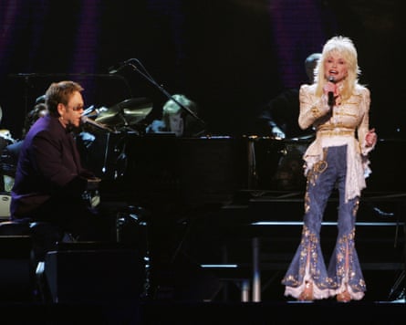 Dolly Parton performing with Elton John at the 39th Annual Country Music Association Awards at Madison Square Garden in 2005.