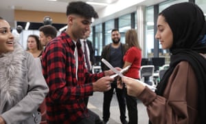 Pupils collect their results in Rochdale this week.